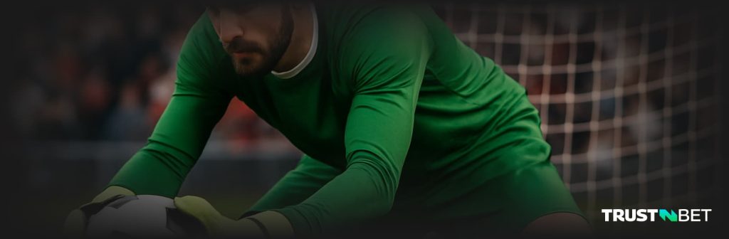 Goalkeeper catches ball