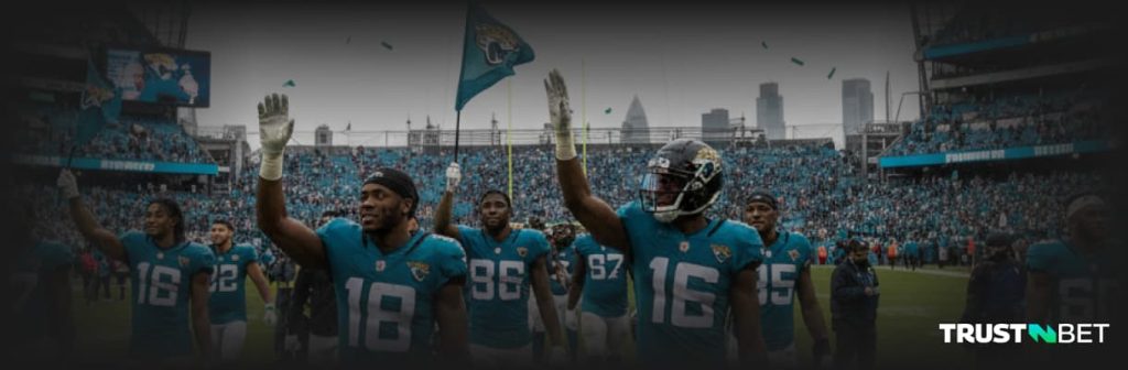 Jaguars players waving to fans after NFL London game