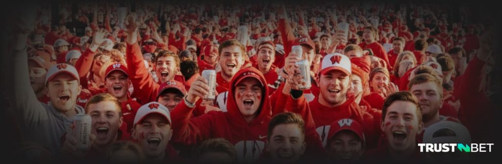 Fans celebrate with bear